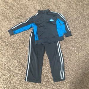 Adidas track suit size 5 great for boys girls and anything in the middle.